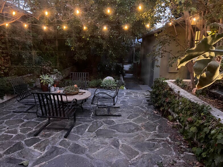 Patio with bistro lights - 5105 Morella Ave