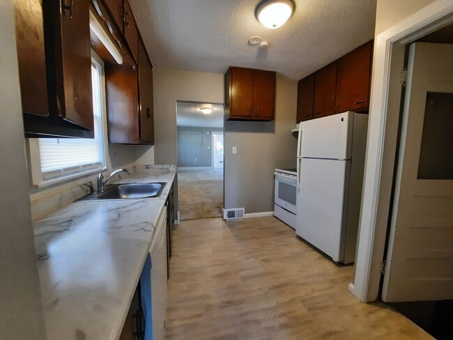 Primary Photo - 3 Bedroom Home with a Fenced Yard and BEAU...