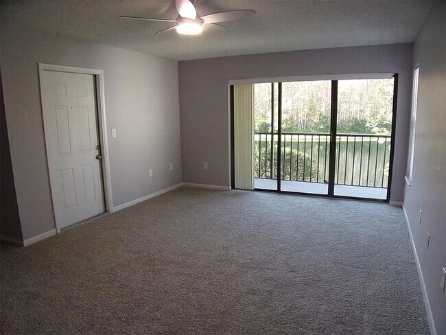 Building Photo - 2-Bed, 2-Bath Condo Retreat in Serene Tarpon Springs Oasis!