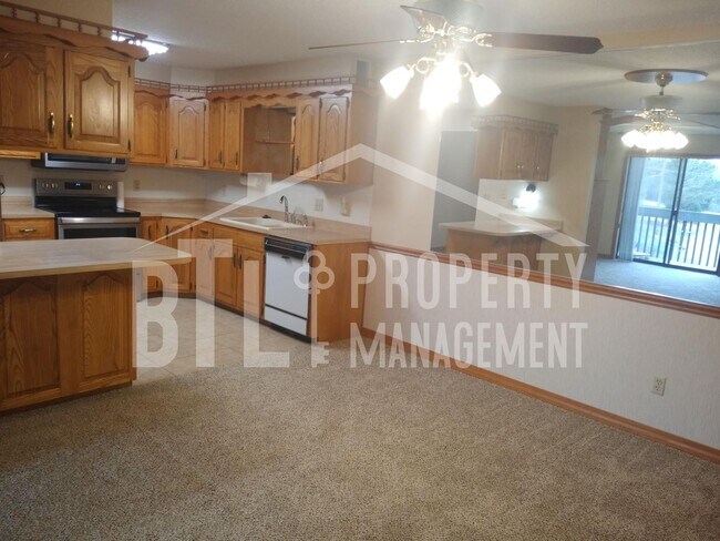 Building Photo - Condo by Lake with RV Spot!! 55+ Community