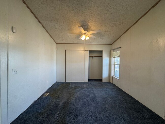 Building Photo - Sunrise Vista -2 Br, 2Ba home with covered carport, fenced yard, storage