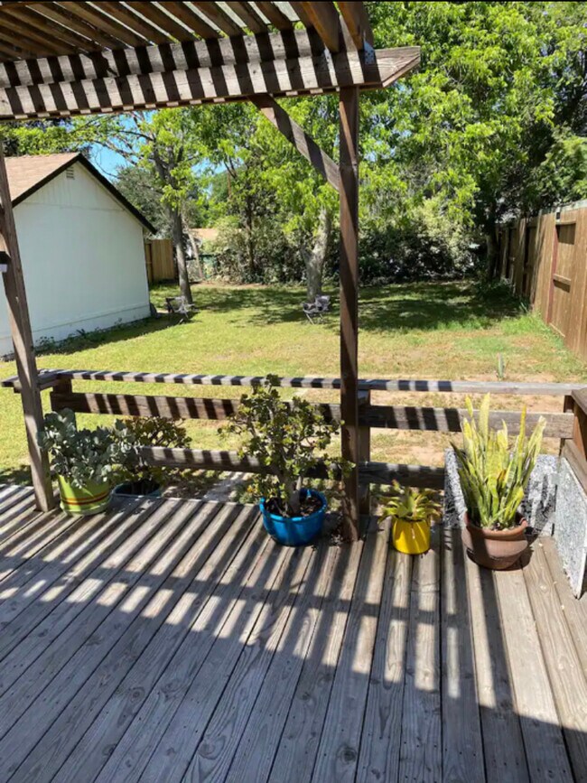 1/4 acre backyard with huge walnut trees, detached garage, large deck for entertainment - 255 N Arnaz St