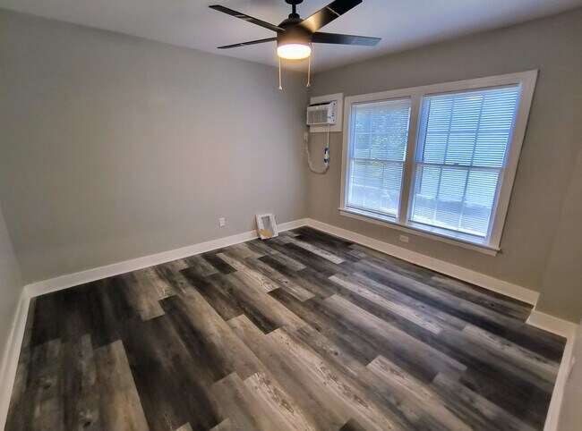Building Photo - Fully Renovated 3-Bedroom Rental – New Appliances, Huge Yard, Garage, & Individual Room A/C!