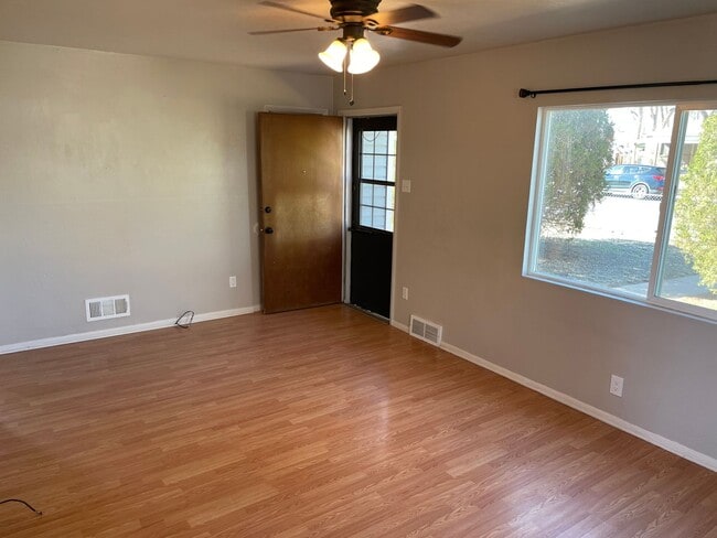 Building Photo - Adorable 2 Bedroom, 1 Bathroom Home with Huge Fully fenced Yard and detached garage, Move-In Ready!