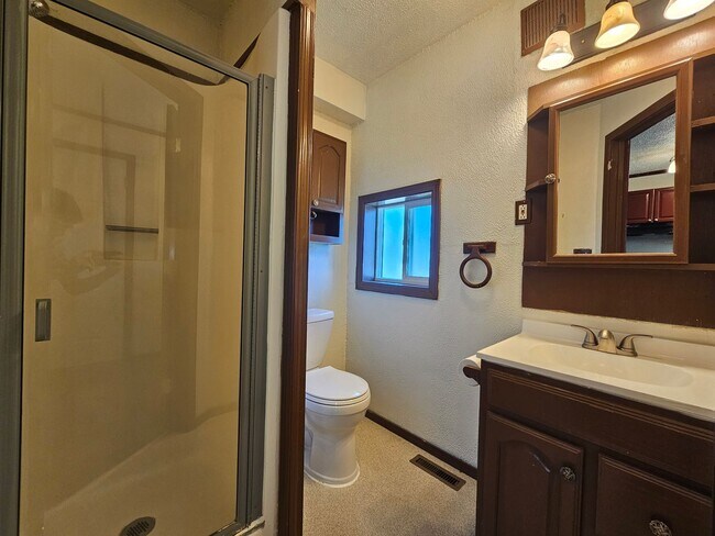 Building Photo - Studio Home Knotty Pine Cottage