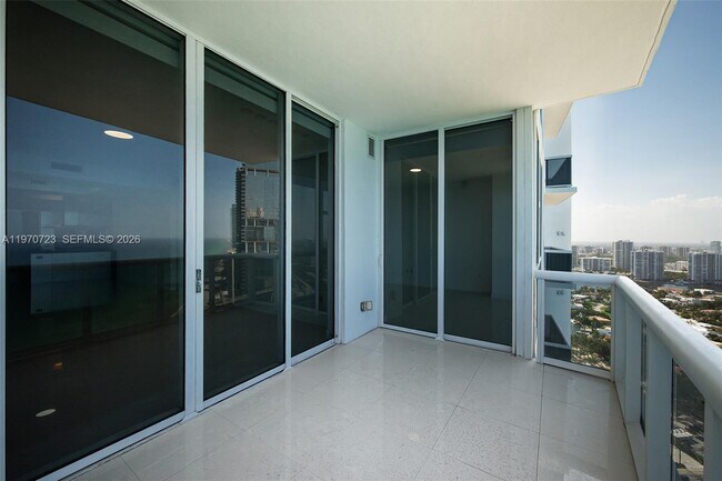 Building Photo - 18201 Collins Ave