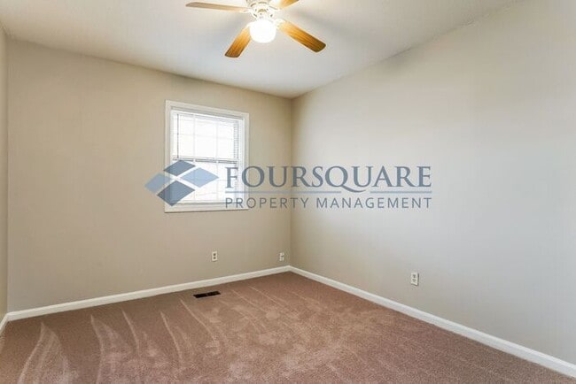 Building Photo - Spacious Townhome with Wood-Burning Fireplace, Large Deck & Storage Room , Convenient North Ridge...