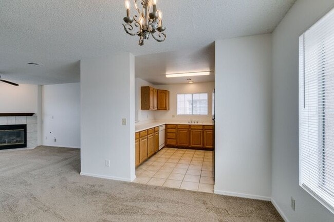 Building Photo - Charming Second-Floor Condo with Two Bedrooms and Fireplace