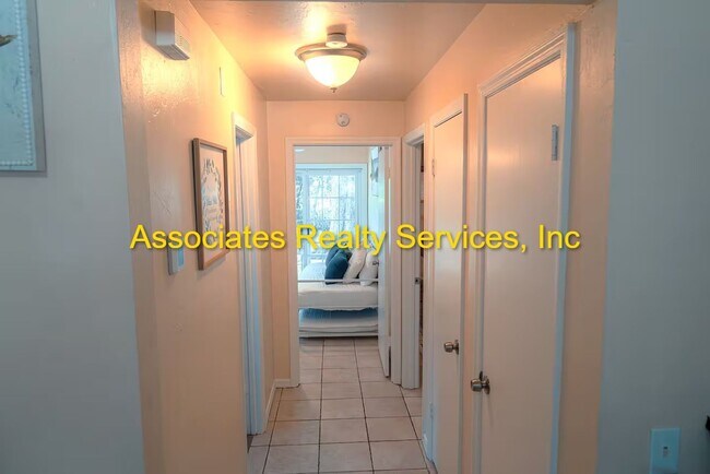 Building Photo - Beautifully furnished  2-Bedroom Duplex – ...
