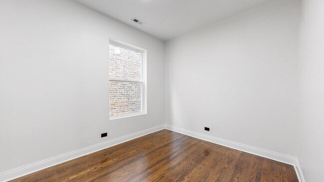 Building Photo - 6227 S Langley Ave