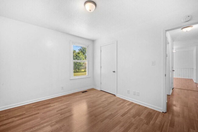 Building Photo - Spacious Yard + Fresh Interior Updates!