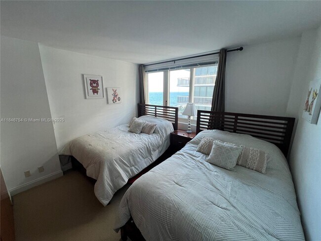 Building Photo - 9499 Collins Ave