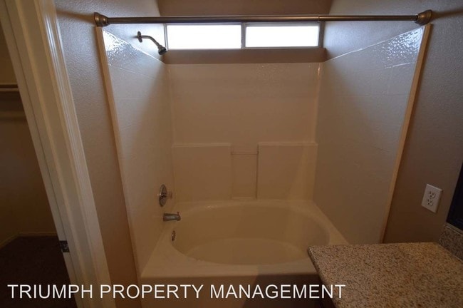 Building Photo - 8820 Spinning Wheel Ave