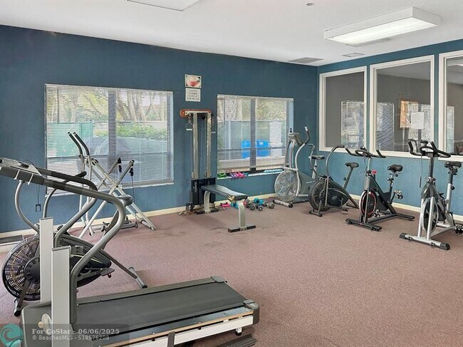 Building Photo - 6090 N Sabal Palm Blvd