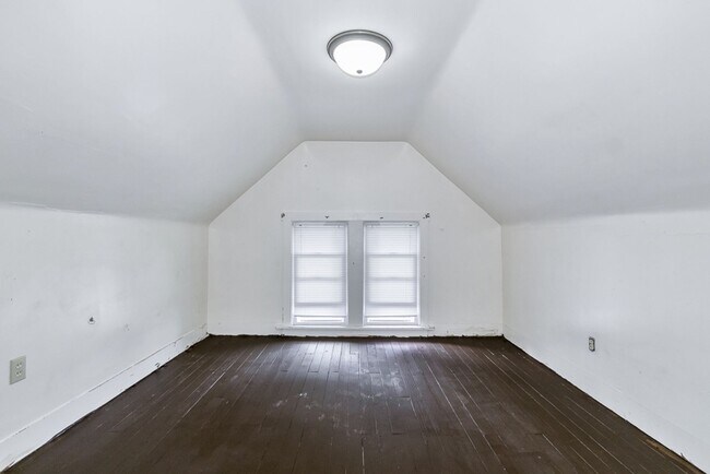 Building Photo - Charming 3BR Home with Classic Woodwork, Porch & Bonus Attic Space