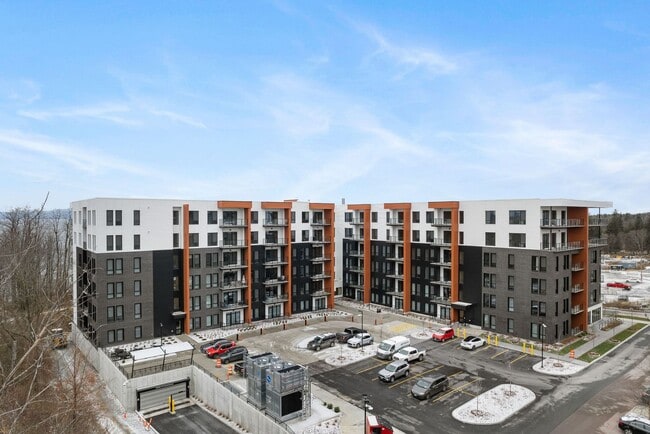Building Photo - 2 Bedroom Corner-Unit with Wooded Balcony ...
