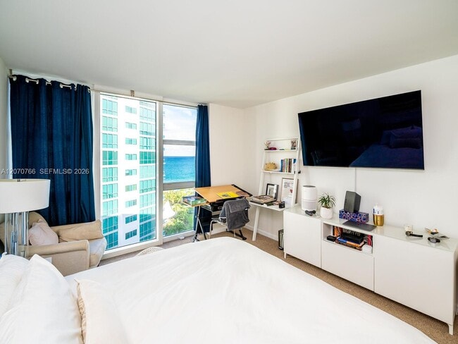Building Photo - 10275 Collins Ave