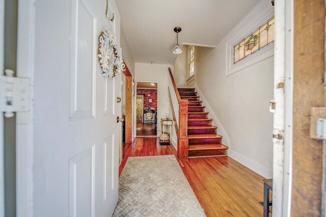 Building Photo - Charming 5-Bedroom Home with Exposed Brick and Modern Upgrades