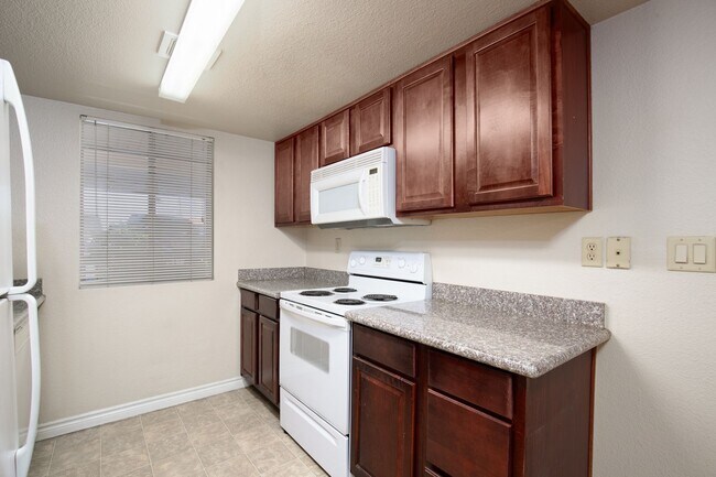 Building Photo - First floor unit in guard gated SW communi...