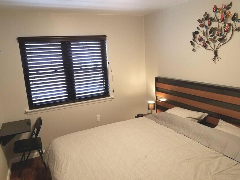 Both bedrooms overlook your private patio/garden area. - 516 S 12th St