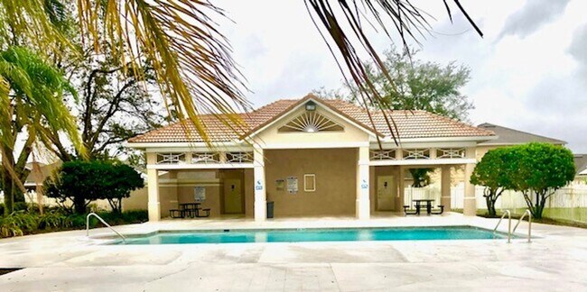 Building Photo - Nice 2X2 located on 2nd floor- Tile & lami...
