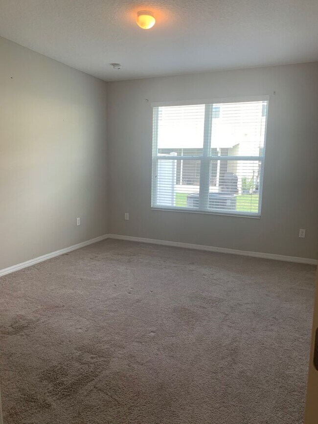 Building Photo - MOVE IN SPECIAL- 4/2.5 Energy Efficient Townhome in St. Cloud