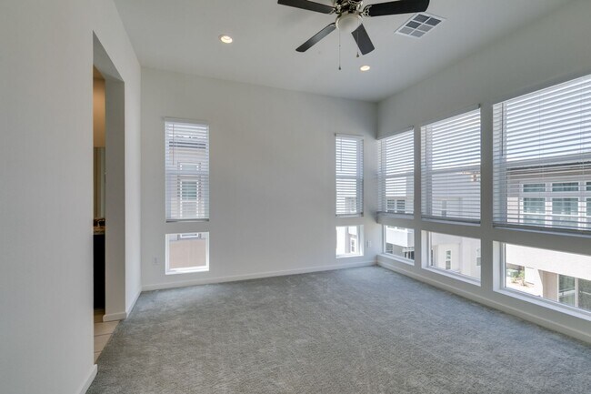 Building Photo - Stunning 4-Level Townhome in Inspirada | R...