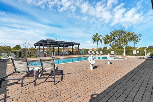 Building Photo - 16748 Lazy Breeze Loop