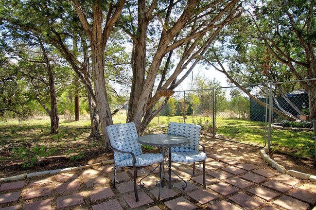 Building Photo - 110 Real Woods View E