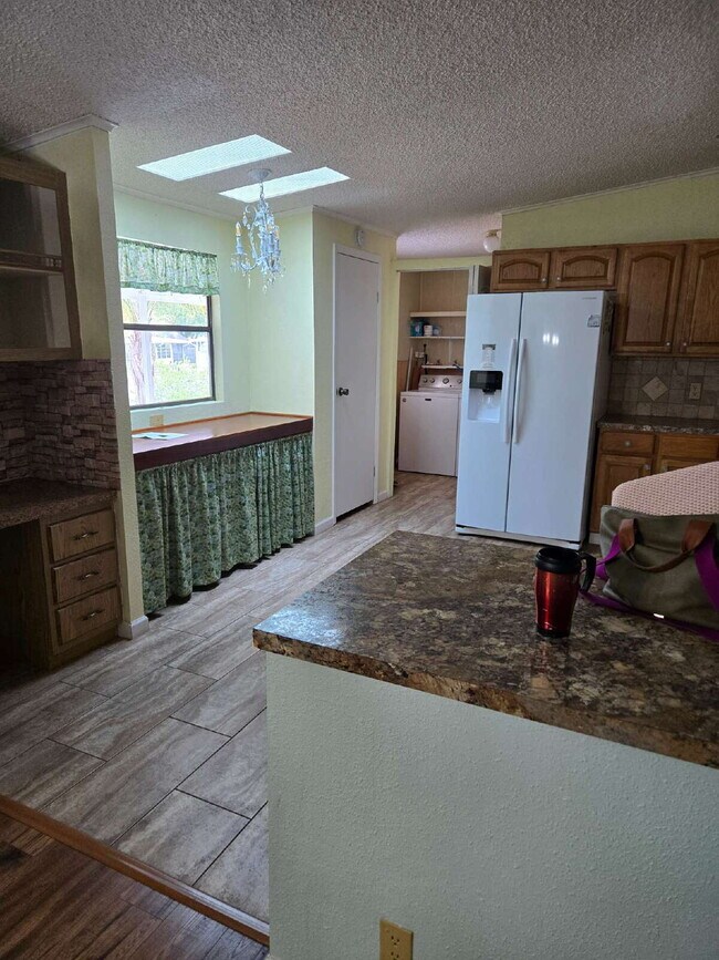 Building Photo - "Charming 3-Bed, 2-Bath Mobile Home Retrea...