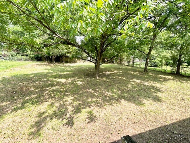 Building Photo - Spacious 4-Bedroom, 2-Bath Home Located in...