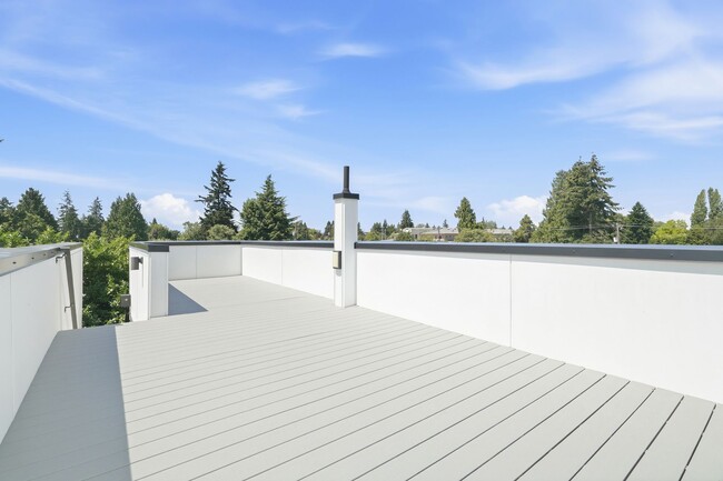 Building Photo - Modern 2 Bedroom with Rooftop Retreat and Garage
