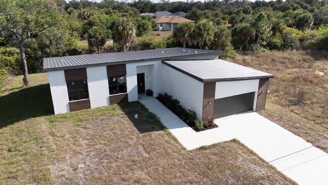 Building Photo - Brand New 3 Bedroom Canal Front Home for Rent in North Port