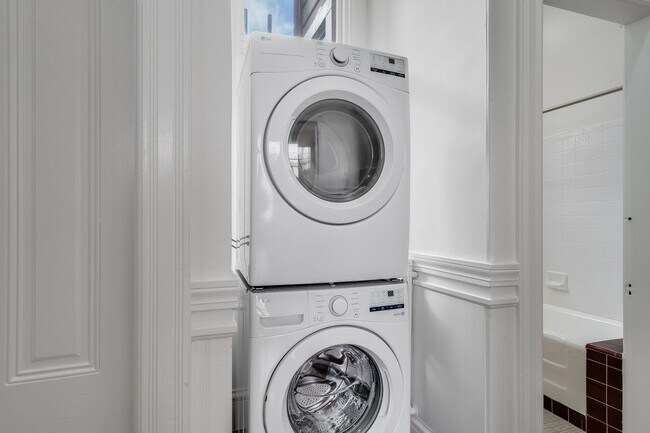 Building Photo - Remodeled pet friendly, top floor 2BR with in-unit laundry