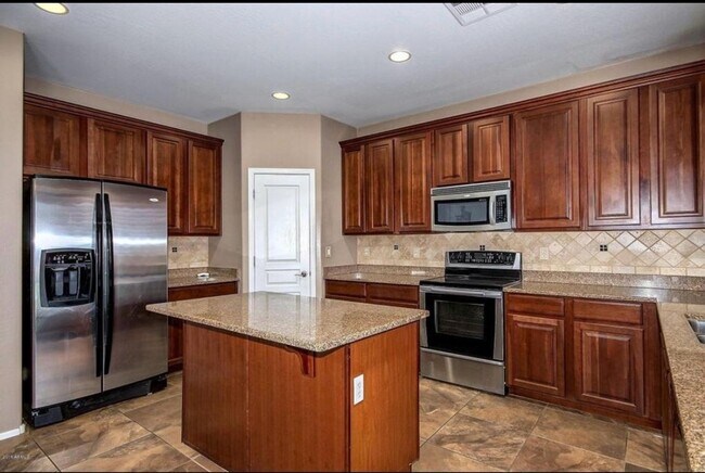 Building Photo - Stunning 4BR House in Phoenix with sparkling pool, resort style backyard and solar panles