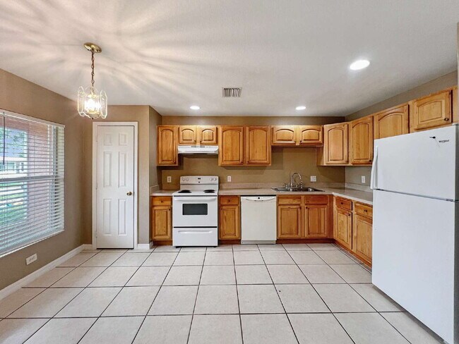 Building Photo - Your Duplex Dream Just Got Merrier! Charmi...