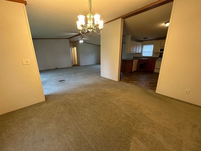 Building Photo - Charm & Commuter Convenience – 3BR/2BA Outside City Limits