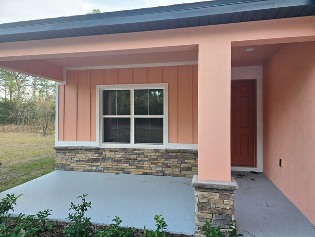 Building Photo - Brand New & Beautiful 3/2/2 in Citrus Spri...