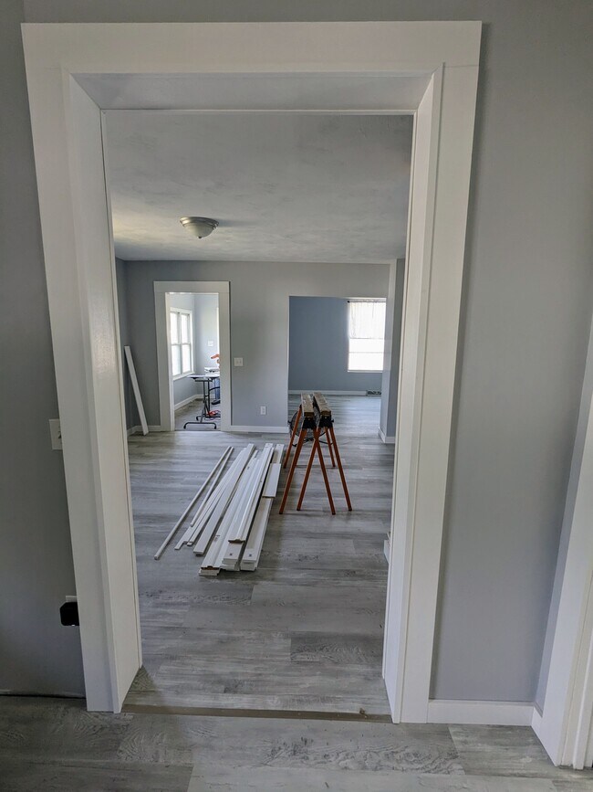 Dining, living room view from kitchen - 413 N Maple St