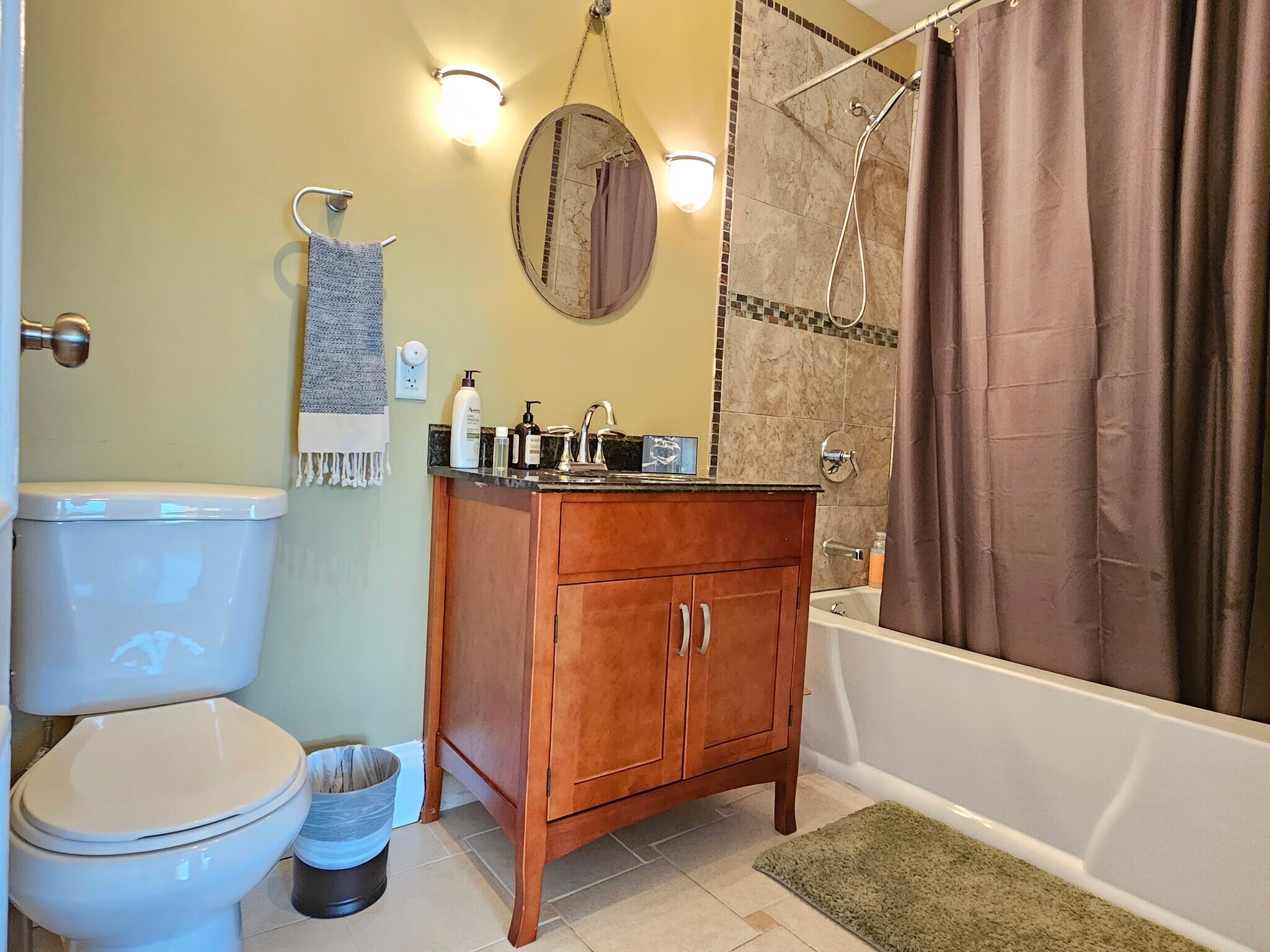 Second full bathroom located off living area - 128 Vinton St