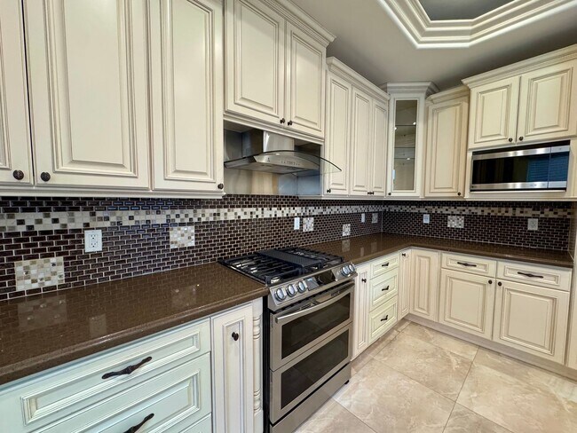 Building Photo - Peaceful North Hollywood street, charming three-bedroom, three-bathroom residence