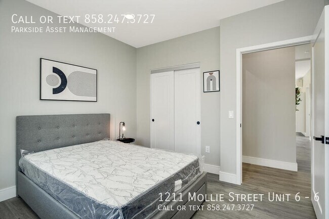 Building Photo - $1,000 Move-in Credit! The Carl on Lauretta