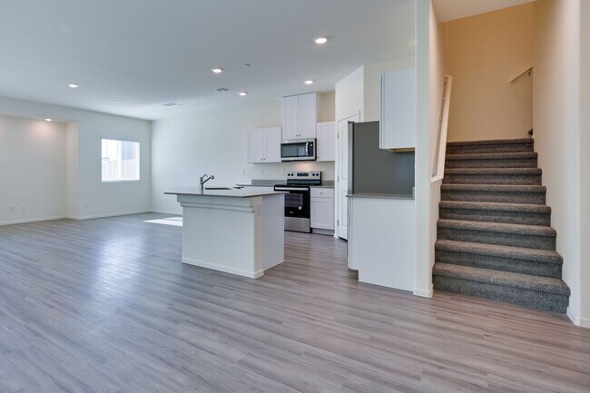 Building Photo - NW 3 Bedroom Townhouse!! Gated Community Pool!! 2 Car Garage!!! No Carpet downstairs.