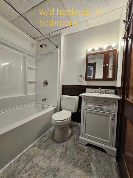 New bathroom with solid wood vanity and marble top - 489 Lincoln St