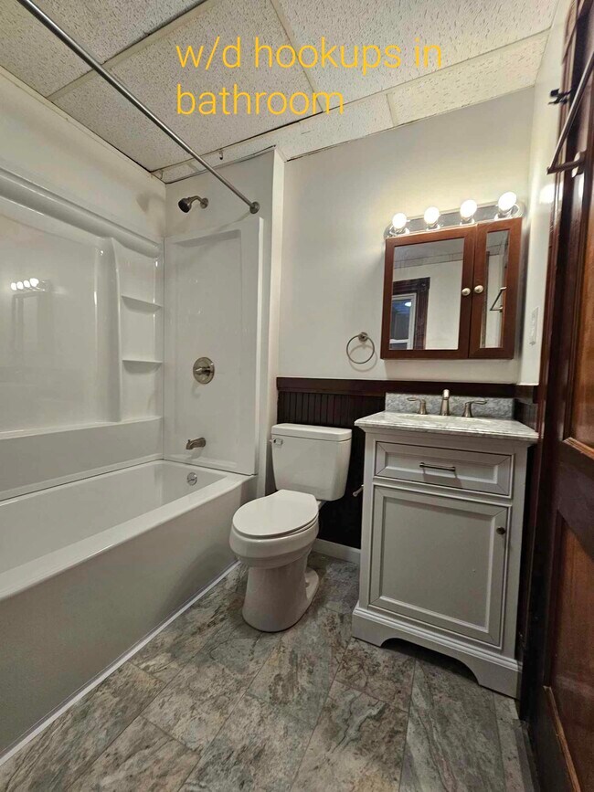 New bathroom with solid wood vanity and marble top - 489 Lincoln St