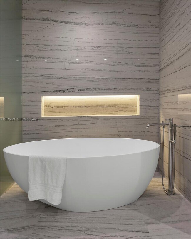 Building Photo - 8701 Collins Ave