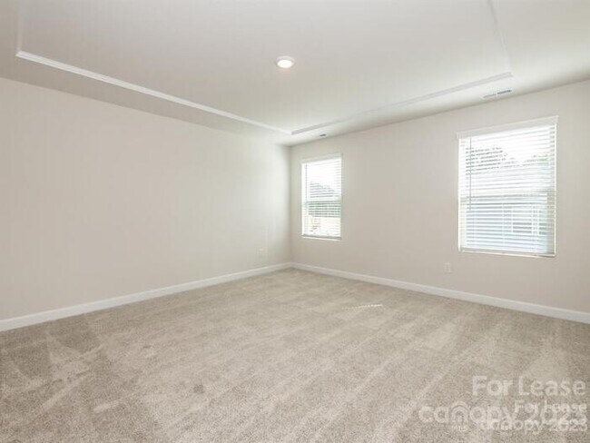 Building Photo - Charming 3-Bedroom Home with Landscaped Ba...