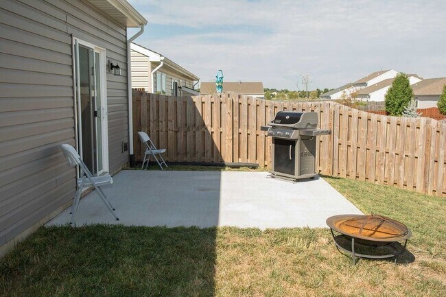 Building Photo - House with Fenced Backyard