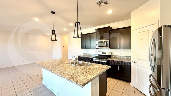 Building Photo - 40414 W Sunland Dr