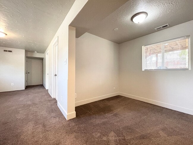 Building Photo - Awesome Split Entry with New Paint & Floor...